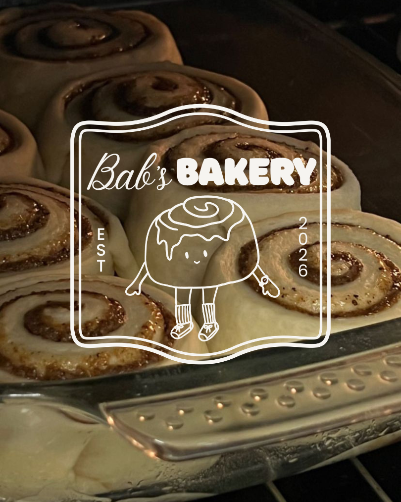 Cinnamon rolls baking in a glass dish